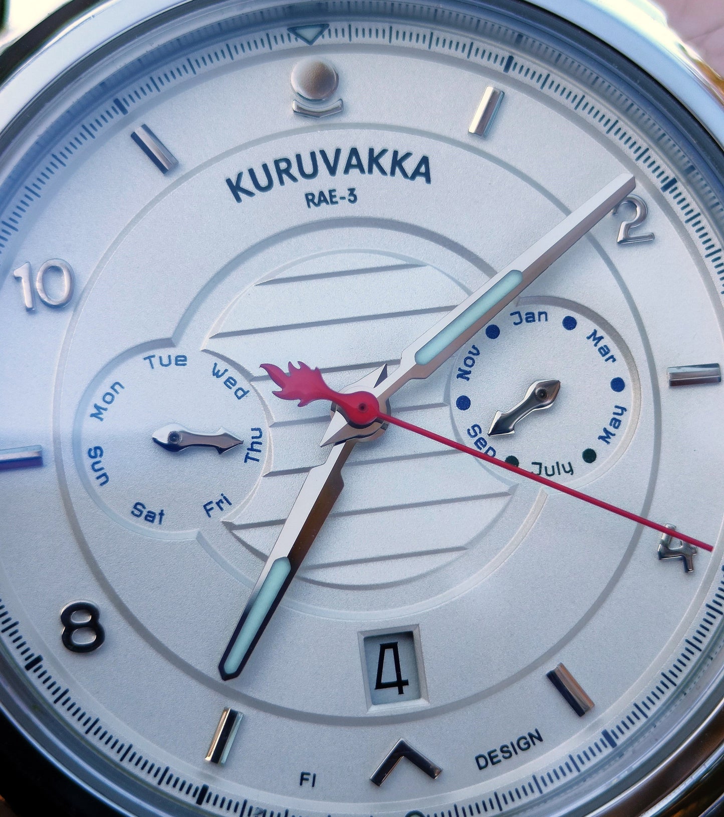 Close up of the white dial of the RAE-3 white mechanical wristwatch
