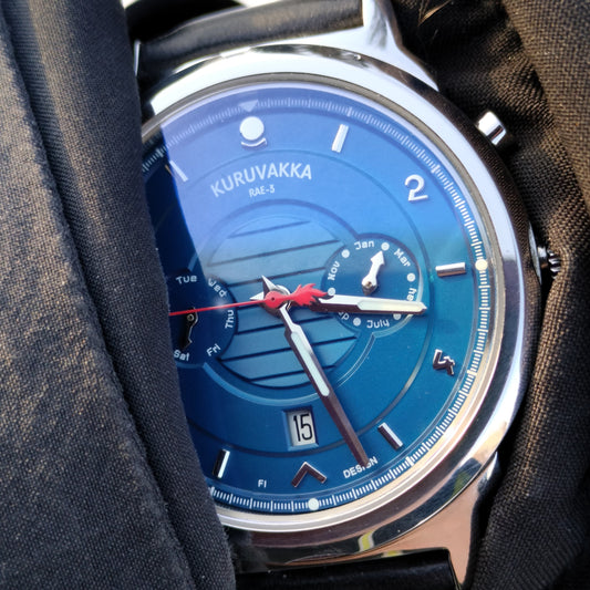 Blue dial mechancial watch wrist shot